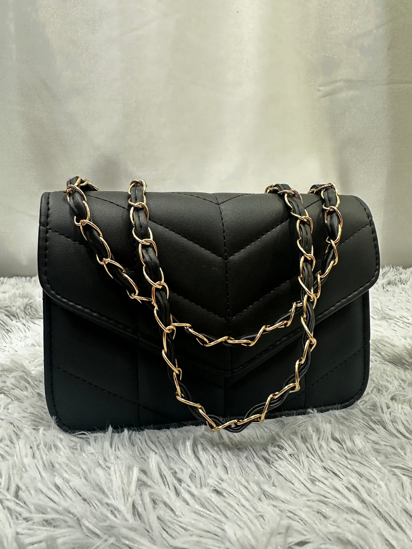 MINI BAG TRAPUNTATA in PELLE - NERA